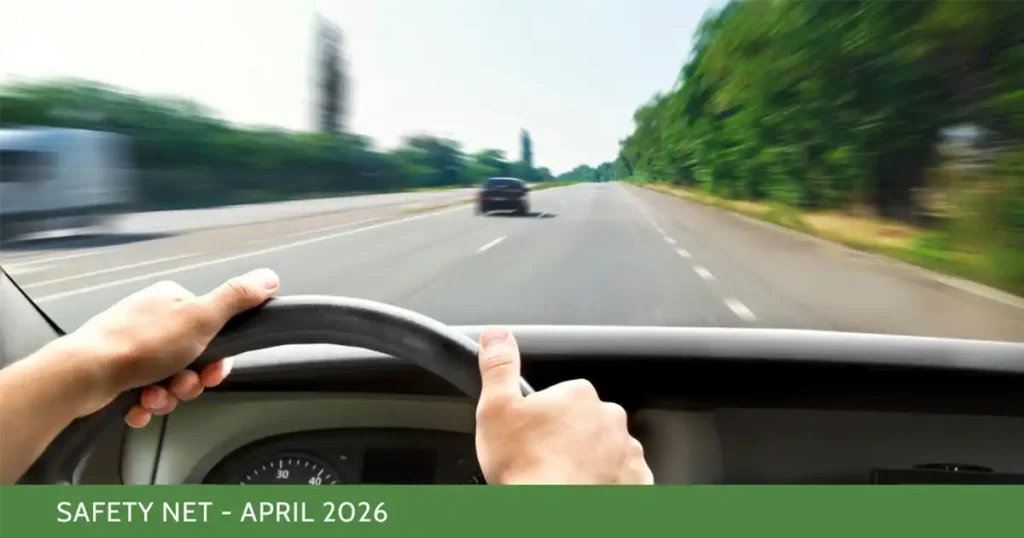 Hands on steering wheel, driving fast